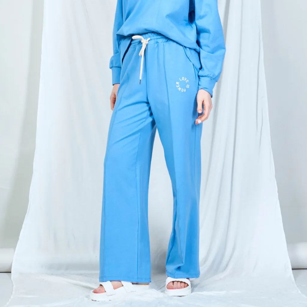 Embroidered drawstring trousers wholesale
