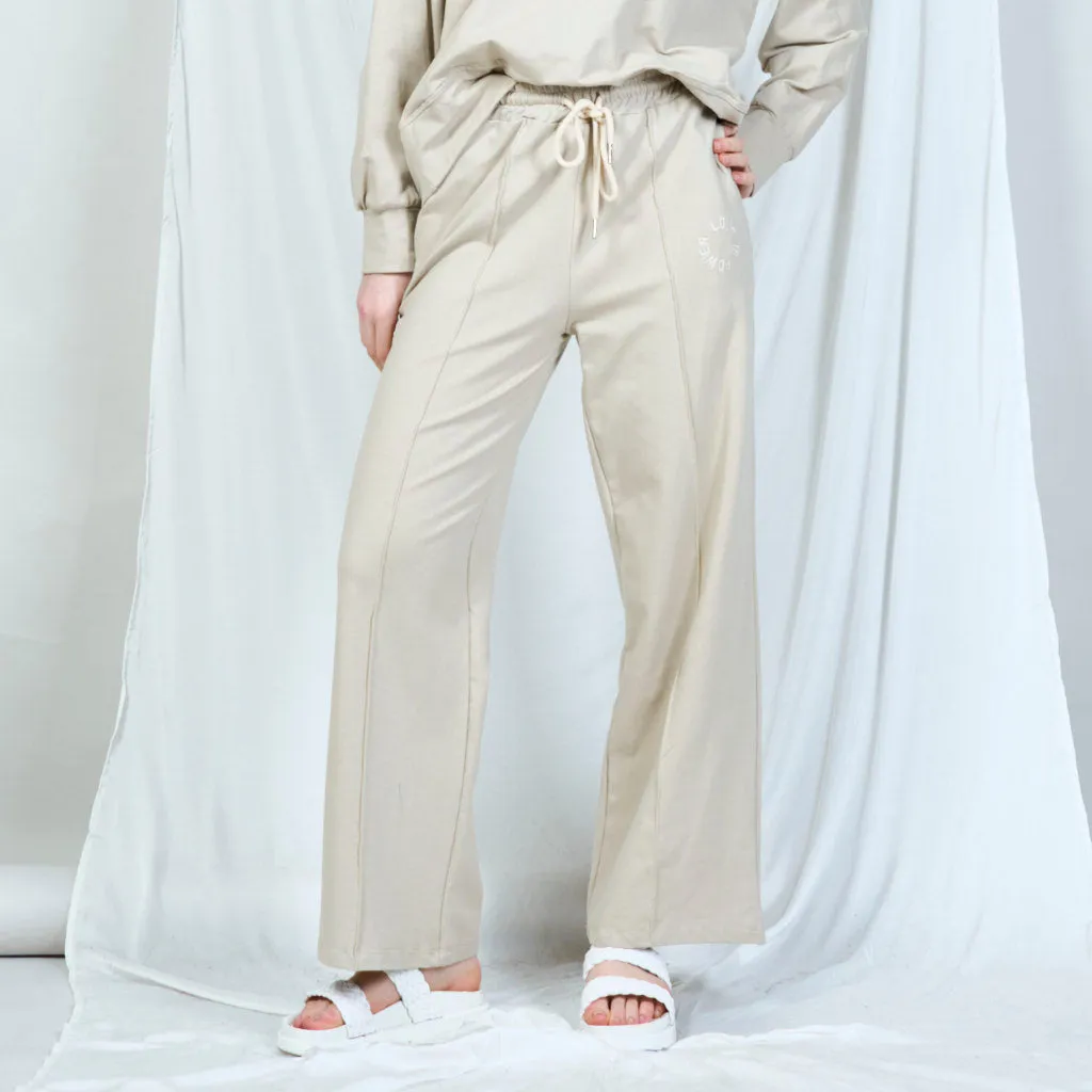 Embroidered drawstring trousers wholesale