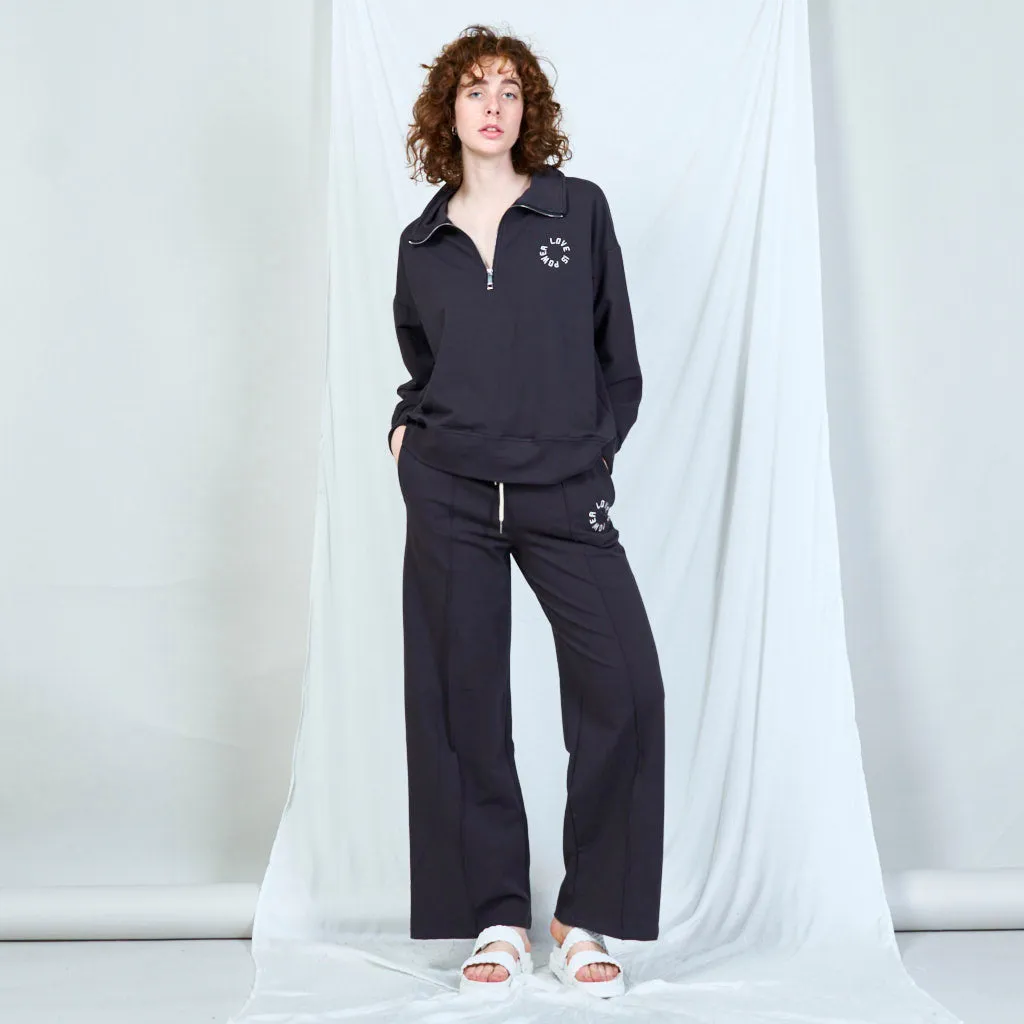 Embroidered drawstring trousers wholesale