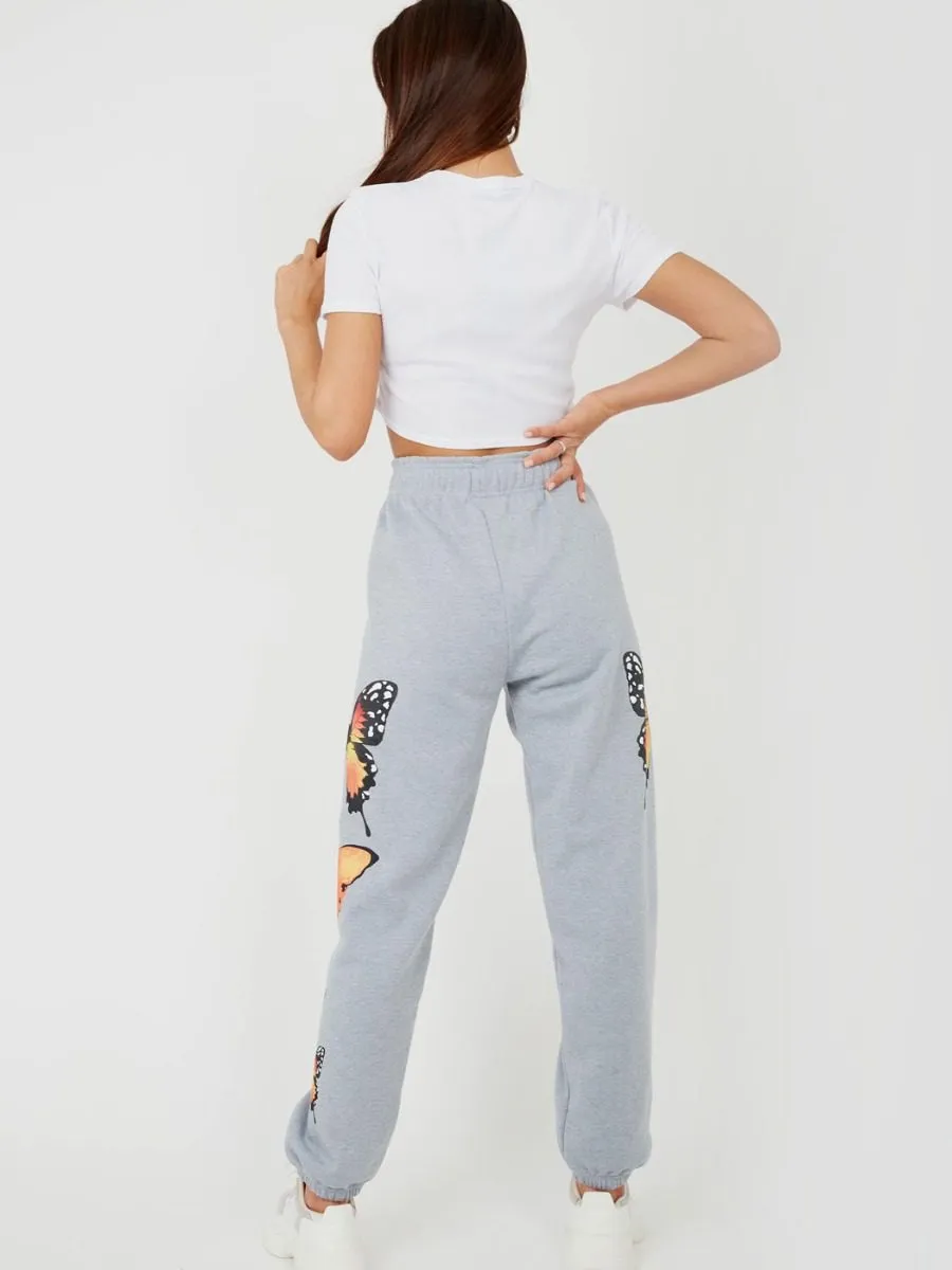 Machela Butterfly Graphic Oversized Fleece Joggers In Grey