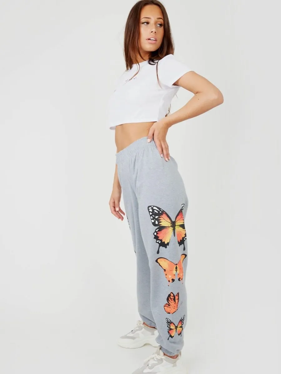 Machela Butterfly Graphic Oversized Fleece Joggers In Grey