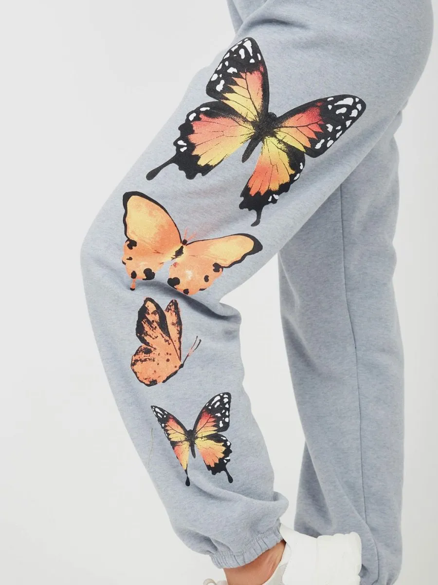 Machela Butterfly Graphic Oversized Fleece Joggers In Grey
