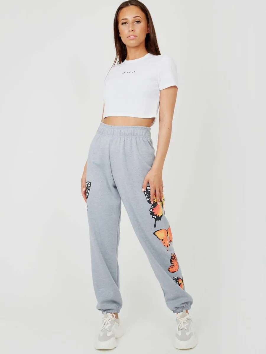 Machela Butterfly Graphic Oversized Fleece Joggers In Grey